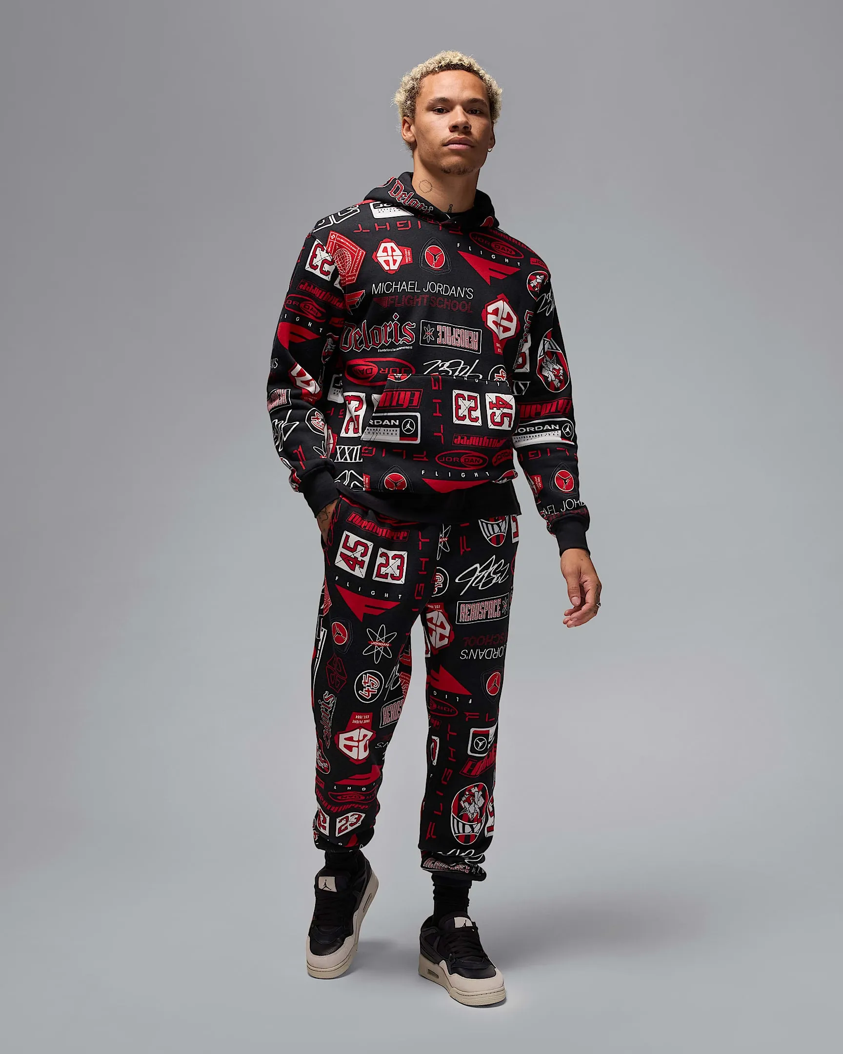 Nike Men's Jordan Essentials Printed Fleece Pants Apparel - Black / Varsity Red